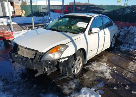 2009 Nissan Altima Hybrid from USA, damaged, VIN 1N4CL21E99C107818